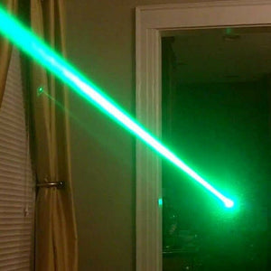 green laser powerful beam burning